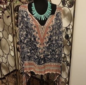 Sheer, airy shawl poncho